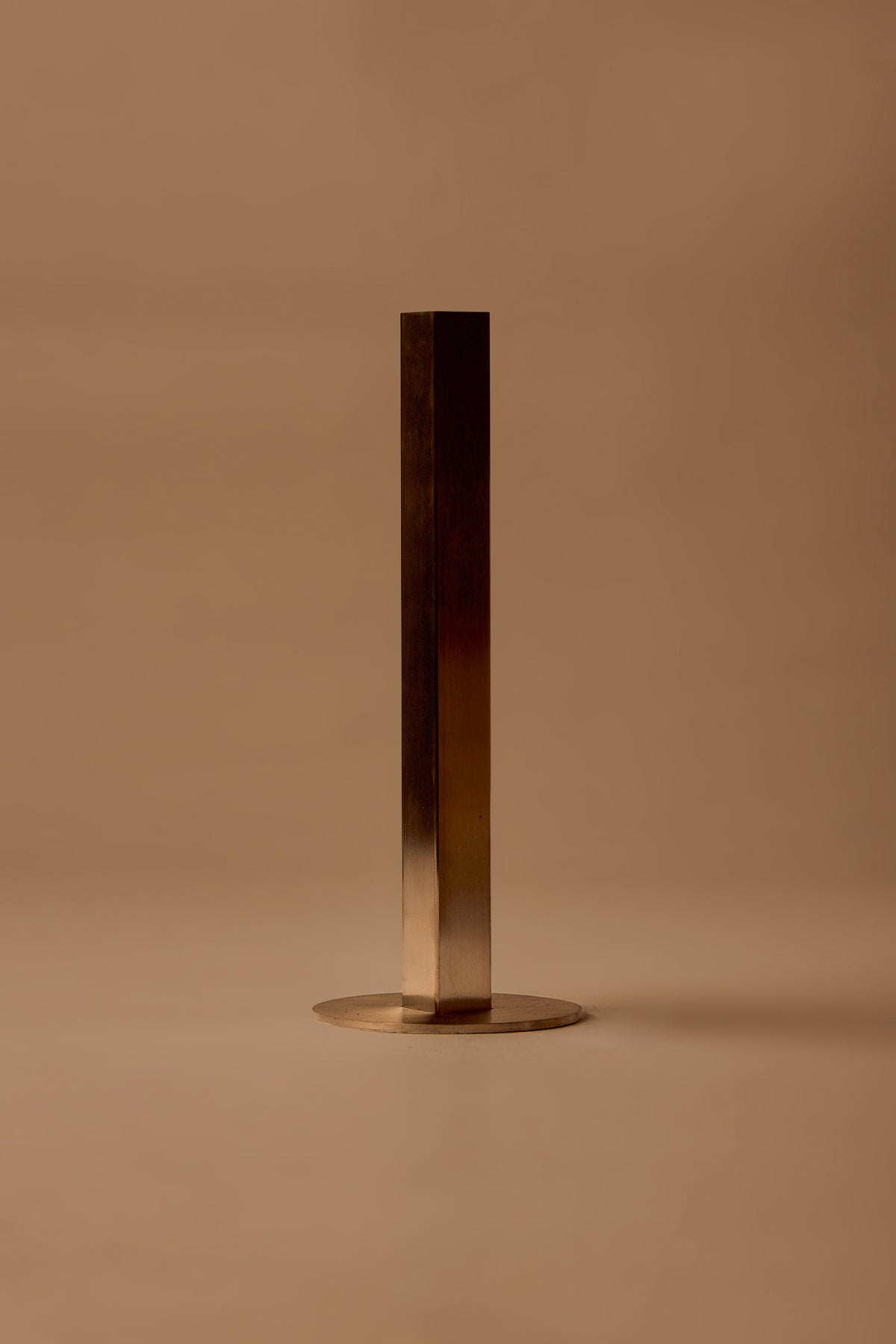UY Studio CORE Flower Vase made of stainless steel, minimalist single stem flower vase for modern interior design, designed in Berlin, Germany.