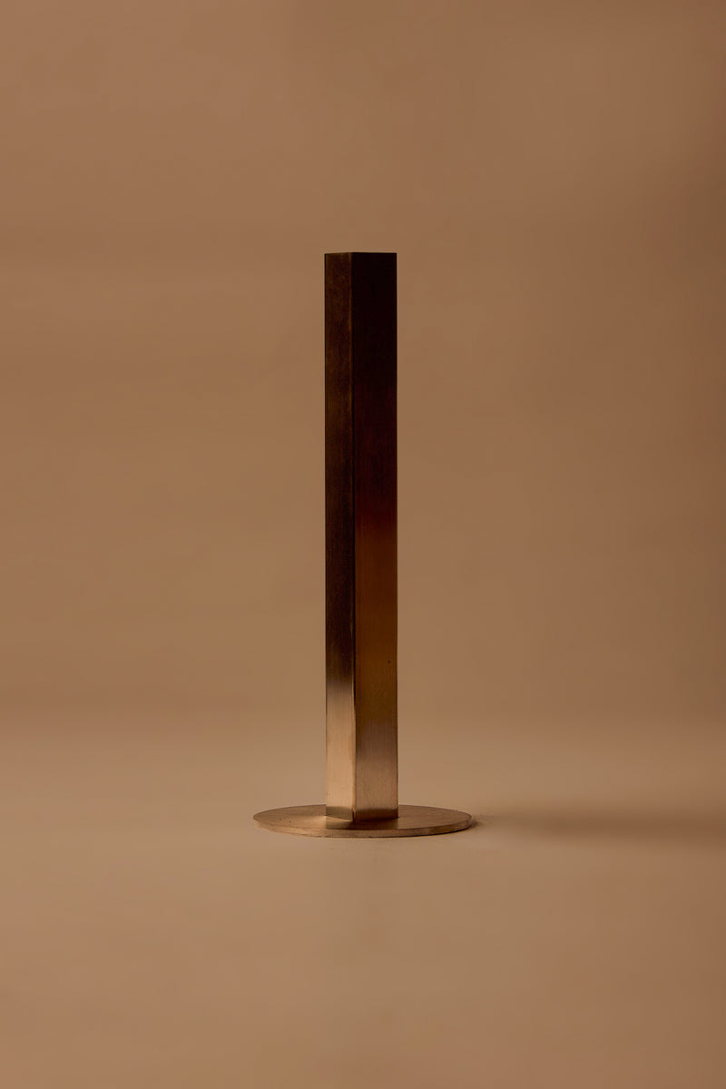 UY Studio CORE Flower Vase made of stainless steel, minimalist single stem flower vase for modern interior design, designed in Berlin, Germany.