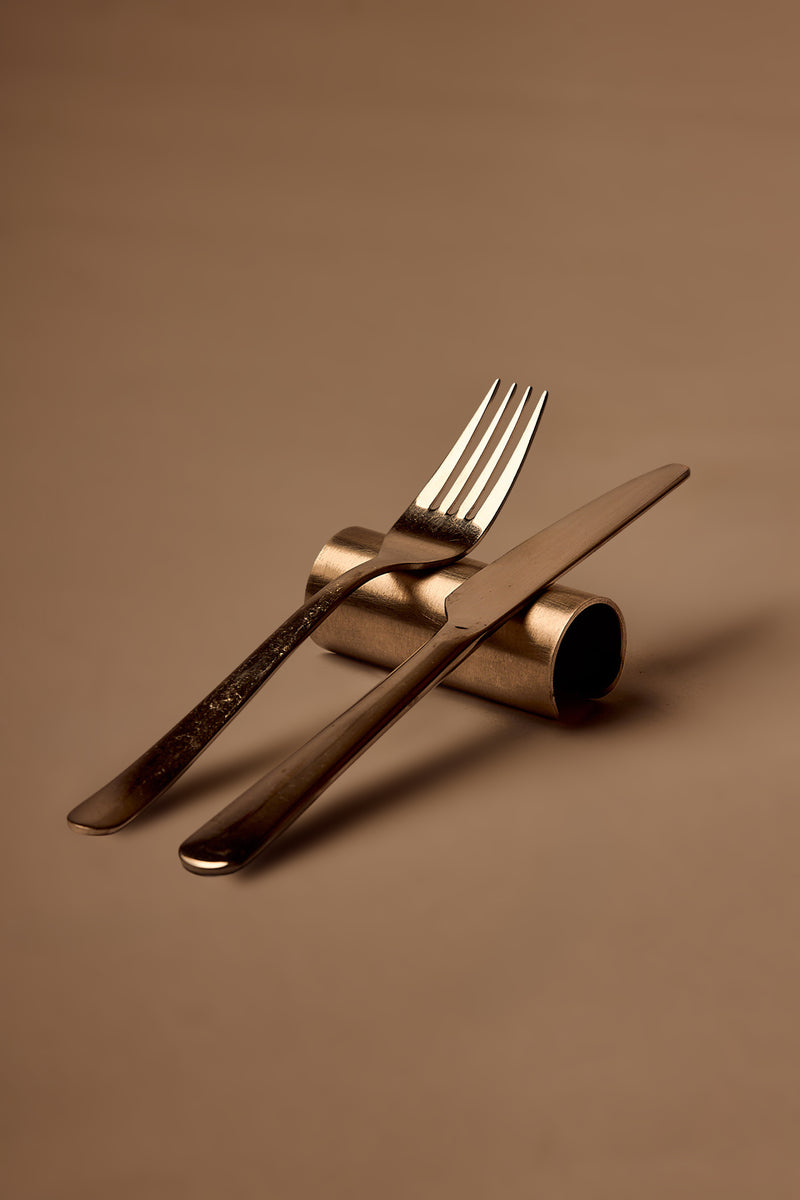 UY Studio CORE Cutlery and Napkin Stand made of stainless steel, minimalist tableware organizer and modern table accessory designed in Berlin, Germany.