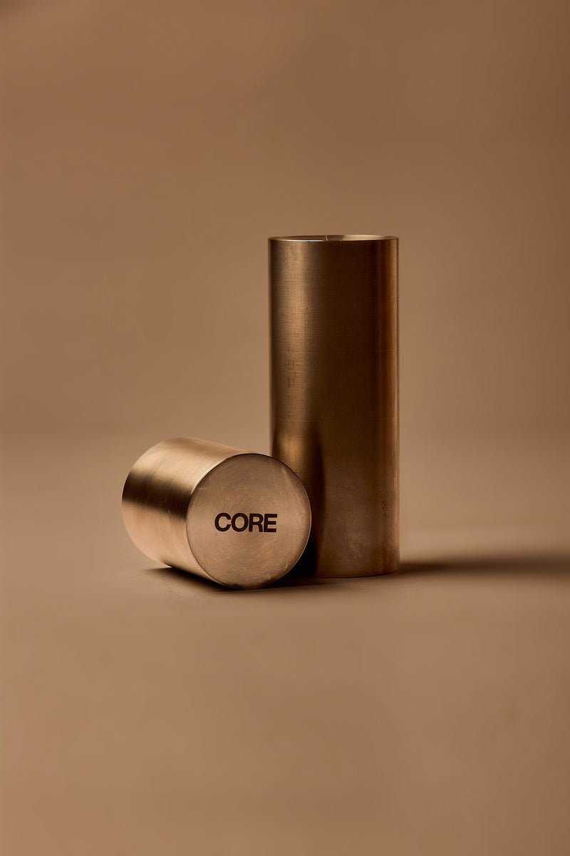 UY Studio CORE Tube made of stainless steel, minimalist Ikebana flower vase and candle holder for modern interior design Berlin Germany