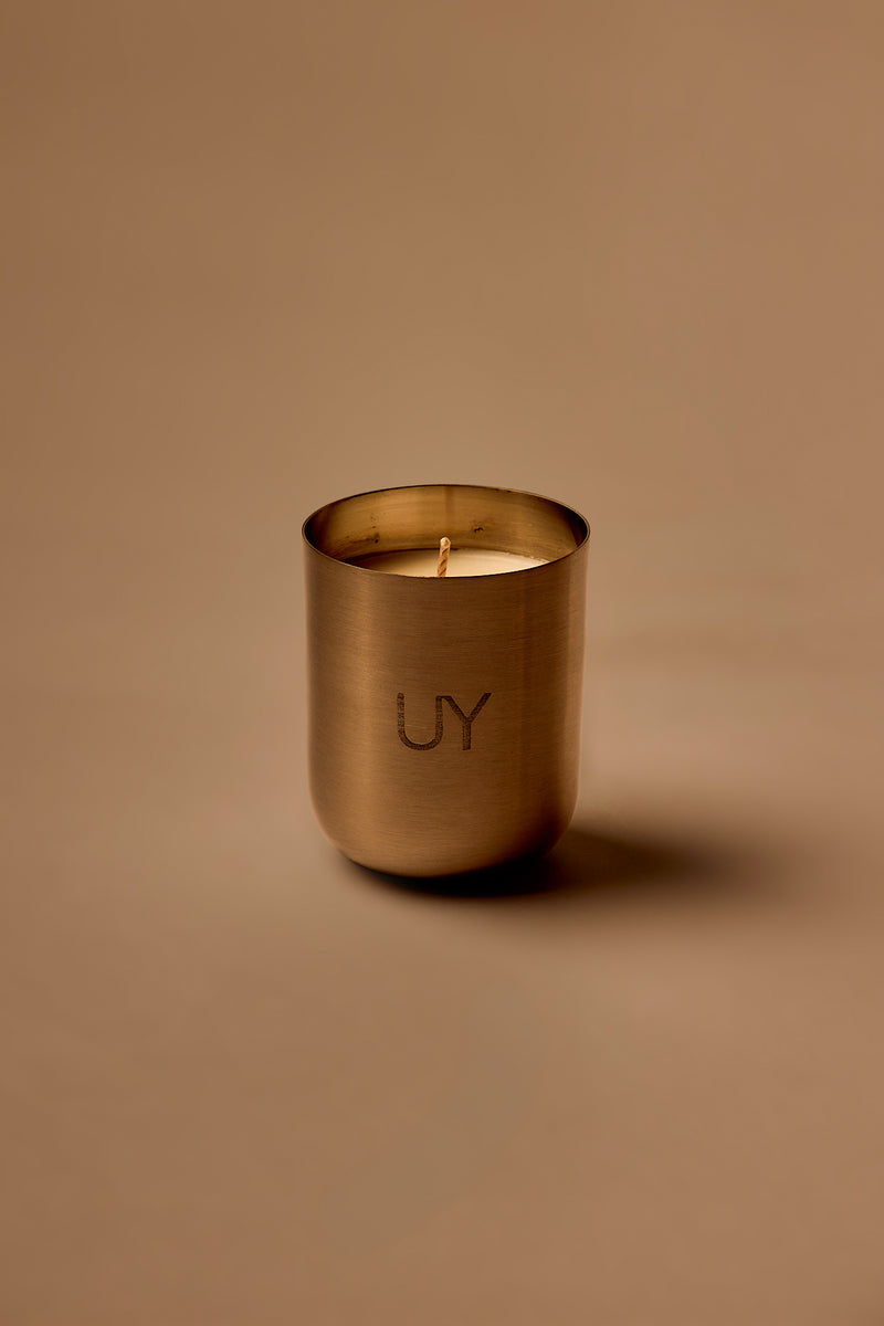UY Studio S Steel Candle luxury handmade scented candle in a minimalist stainless steel jar, crafted in Berlin, Germany. High-quality fragrance with Bergamot, Rose, Cardamom, Jasmine and Amber notes.